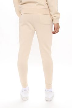 Available In Black, Grey, White, Navy, Red And Tan Elastic Waist With Drawstring Side Hand Pockets Back Patch Pocket Ribbed Cuff At Bottom Of Leg 80% Cotton 20% Polyester Imported | Mens Tyson Jogger Pant in Tan size Medium by Fashion Nova Fitted Cotton Sweatpants With Tapered Leg, Winter Casual Fitted Joggers, Fitted Solid Sweatpants With Side Pockets, Casual Fitted Beige Sweatpants, Fitted Cotton Joggers For Fall, Fitted Beige Casual Sweatpants, Cream Cotton Bottoms For Winter, Winter Cream Cotton Bottoms, Fitted Joggers With Side Pockets For Spring