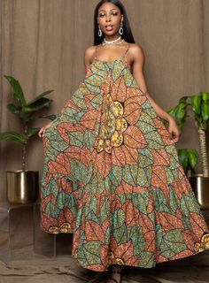 Please be advised that sold out sizes will not be restocked. You'll love the way this maxi dress moves with you during everything from a day at the beach to a night on the town. The artistic touch adds an unexpected element of class to your summer look, guaranteed to make heads turn. XS S M L XL 2XL 3XL BUST 31½ 34½ 37¾ 41 45½ 50½ 55 WAIST 25¼ 28½ 31½ 34½ 39½ 44 53½ Hips 34½ 37¾ 41 44 48 52 56 Length 44 44 44 44 46 46 46 Summer African Dresses, Summer Ankara Fabric Maxi Dress, African Maxi Dresses Afrikrea.com, Patterned Printed Maxi-length Kaftan, Vibrant Maxi-length Spring Kaftan, Summer Maxi-length Multicolor Print Kaftan, Afro Fashion, African Inspired Clothing