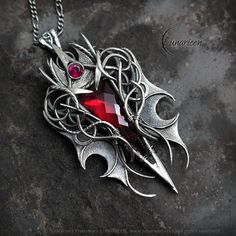 NYRNHYR - Exclusive gothic, vampire, fantasy style necklace. Fully handmade work (wire wrapping technique with oxidizing and polished silver). Main base gem: Red Quartz 11,5 Ct (2,3g). Additional stones: Cubic Zirconia. Material: silver (Sterling Silver, Fine Silver / 925, 999). We use only high-quality silver. Our silver does not contain harmful nickel.  Chain length: 42 cm + 7 cm, Figaro, with a decorative clasp, adjustable. Pendant length: 6,2 cm, width: 3,5 cm. Pendant weight: approx 20g. Co Gothic Red Necklace For Cosplay, Red Gothic Necklace For Cosplay, Red Fantasy Jewelry For Cosplay, Handmade Gothic Jewelry For Fantasy Events, Red Fantasy Metal Jewelry, Medieval Jewelry For Halloween Gift, Gothic Wire Wrapped Pendant Jewelry, Fantasy Red Metal Jewelry, Red Fantasy Jewelry For Halloween