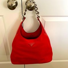 Red Prada Bag With Silver Handle. Brand New With Tags Still On. Have Bag And All Authentic Cards With It. Red Tote Shoulder Bag With Palladium Hardware, Designer Red Bags With Silver-tone Hardware, Red Shopping Bags With Palladium Hardware, Modern Red Shoulder Bag With Silver-tone Hardware, Luxury Red Hobo Bag For Everyday Use, Chic Red Shoulder Bag With Palladium Hardware, Red Prada Bag, Prada Black Bag, Prada Hobo Bag