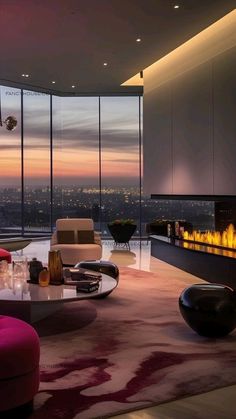 a living room filled with furniture and a fire place in the middle of it's wall