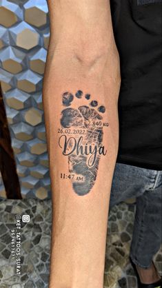 a person with a tattoo on their leg