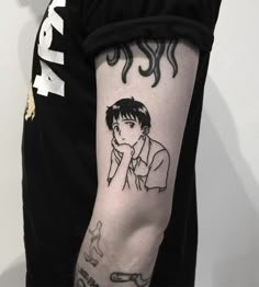 a person with a tattoo on their arm