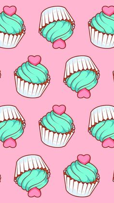 cupcakes with blue icing and pink hearts on a pink background seamless