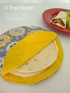 the simple tortilla cozy is easy to make and looks great on someone's table