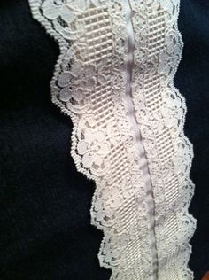 the white lace has been stitched together