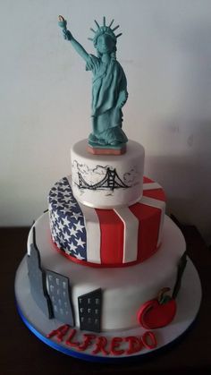 a cake with the statue of liberty on top