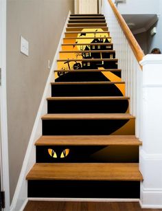 the stairs are decorated with halloween themed wall decals and stickers to decorate them