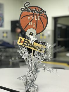 a basketball trophy sitting on top of a table