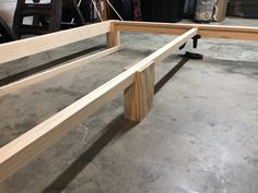 a wooden bench being built in a garage