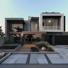 a large modern house with lots of windows