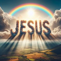 the word jesus is surrounded by clouds and rainbows in the sky over a valley