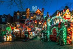 a house covered in christmas lights and decorations