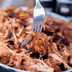 a fork is stuck into some food in a bowl