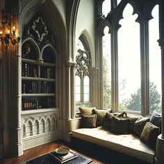 a living room filled with lots of furniture next to large windows and bookshelves