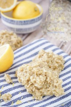 lemon no bake cookies on a blue and white towel with two lemons in the background