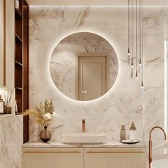 a bathroom with marble walls and flooring has a round mirror on the wall above the sink