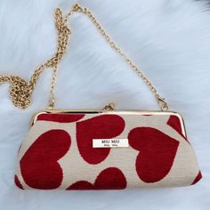 New Miu Miu Beaute Pochette Clutch Gift With Purchase Comes In A Box With A Chain Beige With Red Hearts. Gold Tone Hardware. Approximate Measurements: 8" 4" Chain Drop: 22" No Hologram, Or A Date Code. It's A Gwp With Perfume Purchase. Clutch Aesthetic, Brunch Attire, Shopping Wishlist, Miu Miu Handbags, Pink Pouch, Designer Clutch Bags, Miu Miu Bag, Red Handbag, Leather Card Case