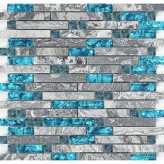 blue and gray glass tile backsplash with silver foil on the bottom, in an irregular pattern