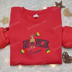 Woody x Nike Disney Embroidered Sweatshirt, Disney Characters Embroidered T-shirt, Best Gift Ideas for Family Welcome to the enchanting world of Tinicloset, where your fashion dreams take on a whimsical twist. At Tinicloset, we specialize in crafting custom embroidered apparel that transcends the ordinary, offering a delightful selection that includes the Woody x Nike Disney... Nike Disney Sweatshirt, Disney Sweatshirts Embroidered, Disney Crew Neck Sweatshirt With Embroidered Logo, Nike Custom Sweatshirts Disney, Disney Embroidered Long Sleeve Sweatshirt, Maroon Hoodie, Hoodie Material, Cowboy Outfits, Blue Sweatshirt