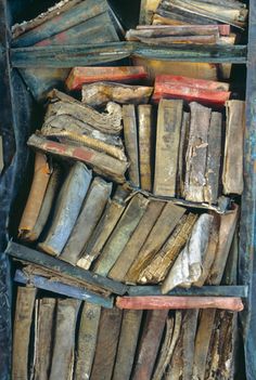 an old book case filled with lots of books