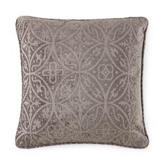 a gray pillow with an intricate design on the front and back, sitting on a white background