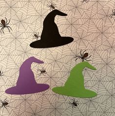 three witches are sitting on top of a spider web wallpaper with green, purple and black silhouettes