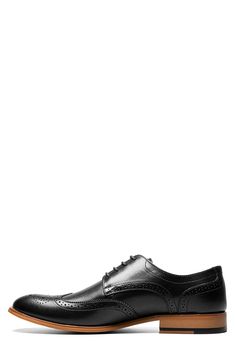 A brogued wingtip leather derby features a memory foam cushioned insole for all-day comfort. Medallion wingtip toe Leather construction Brogued detail Lace-up ties Memory foam cushioned insole Goodyear welt Low heel Leather upper, leather lining, synthetic outsole Imported Business Lace-up Wingtip Shoes With Textured Sole, Classic Wingtip Lace-up Shoes With Cushioned Footbed, Wingtip Lace-up Shoes With Cushioned Footbed For Work, Business Wingtip Lace-up Shoes With Cushioned Footbed, Elegant Formal Lace-up Shoes With Cushioned Footbed, Business Wingtip Oxfords With Cushioned Footbed, Wingtip Oxfords With Cushioned Footbed For Business, Formal Wingtip Lace-up Shoes With Cushioned Footbed, Business Lace-up Wingtip Shoes With Cushioned Footbed