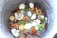 a pot filled with lots of different types of vegetables