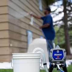 Always get the best results and make quick work of every exterior painting project with the Exterior Paint Kit. The Magnum X5 provides the power to spray unthinned paint with the flexibility to adjust the spray pressure while the extra hose and 20-in spray extension help you finish painting projects faster - plus the TrueAirless 315 spray tip delivers a smaller 6-in spay fan which is ideal for smaller areas while providing a softer spray pattern for a better finish with less overspray. Using bru Paint Sprayer Reviews, Hvlp Paint Sprayer, Best Paint Sprayer, Paint Sprayers, Spray Paint Projects, Airless Paint Sprayer, Using A Paint Sprayer, Handyman Projects, Gallon Of Paint