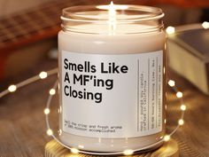 a candle that reads smells like a m f ing closing