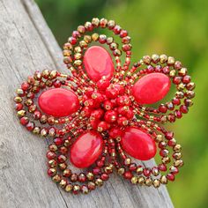 A palette of red and golden hues merges in a captivating design that allows your style to shine with a romantic aura. Thai artisan Nareerat shows her exquisite talent and love for spring in this floral brooch pin handcrafted from quartz and glass beads glamorously arranged on wires, emulating a bloom of passionate beauty. Beaded Pins, Red Quartz, Gift Suggestions, Floral Brooch, Gem Necklace, Beaded Brooch, Women Artisans, Jewelry Packaging, Jewelry Gift Box