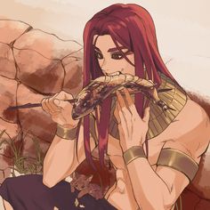 a woman with long red hair eating food