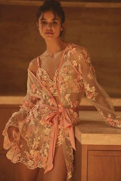 The Kilo Brava Embroidered Short Robe merges comfort and luxury with its intricate embroidery and beading, providing an alluring addition to any loungewear collection. | Embroidered Short Robe by Kilo Brava in Orange, Women's, Size: Largearge, Polyester/Nylon/Elastane at Anthropologie Wedding Night Lingerie, Embroidered Robes, Wedding Robe, Bridesmaid Robes, Mini Slip Dress, Embroidered Shorts, Bridal Robes, Bridal Lingerie, Loungewear Set