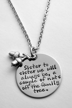 a necklace with a quote on it that says, sister to sisters we will always be in