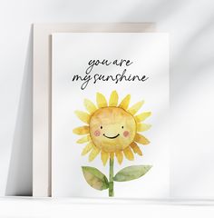 a greeting card with a watercolor sunflower and the words you are my sunshine