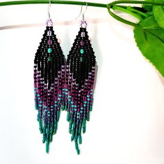 "Seed Bead Earrings 4 inch long.Flowing beads earrings.Bohemian dangle beaded earrings. with fringe are made of high quality Czech and Japanese seed beads. long earrings.Bead weaving techniques. Colors: Black,Purple amethyst,Turquoise,Green. ! Details ! Made with quality Japanese and Czech seed beads ! Professional threads for weaving with beads Tytan and Fireline. ! Length 4 inches ( 12cm) ! Sterling silver plated ear wire. Simple sterling silver ear wire 925 are included with each earrings. ! Purple Bohemian Jewelry With Black Beads, Bohemian Purple Jewelry With Black Beads, Purple Beaded Dangle Earrings With Black Beads, Purple Dangle Beaded Earrings With Black Beads, Purple Dangle Earrings With Beads, Purple Dangle Earrings With Black Beads, Purple Bohemian Long Drop Earrings, Purple Long Drop Bohemian Jewelry, Purple Dangling Beads Chandelier Earrings