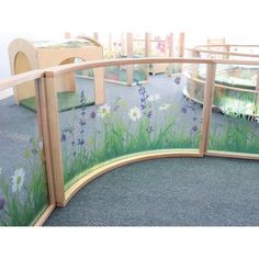 Create a unique nature-inspired toddler area! This 41"W x 24.25"H room divider is a gracefully curved clear acrylic panel that softens corners and features an inviting nature scene that brightens and defines any room environment while providing maximum child visibility and supervision. Use the connector panel accessory [included] to connect the panel to other pieces in our award-winning biophila inspired Nature View Collection [each sold separately] and create a flexible divided area layout in t