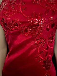 a red dress with sequins on it