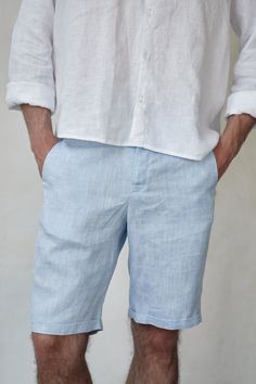 Linen shorts will be a great option for a work in the city or rest on the coast or in the forest. This white & blue melange shorts for men who appreciates sophistication and minimalism. Made of natural linen of the highest quality and flawlessly cut, this thing is suitable for the wardrobe in trendy "old money" style. Made of 100% natural linen, Oeko-Tex certified, free of harmful chemicals. It keeps the temperature of the body + -4 degrees, these clothes are not hot in summer and not cold in winter. Linen allows the skin to breathe, is an anti-allergenic and is not electrified. This is a wear-resistant material and could be washed a lot of times. Custom sizes are available.  Care: Wash at 30-40℃ (104℉) degrees with a gentle cycle with similar colors Do not dry in the sun, lay flat to dry Men’s Linen Shorts, Casual Linen Bermuda Pants, White Linen Bermuda Bottoms, Casual Bermuda Linen Pants, White Linen Bermuda Shorts With Pockets, Linen Pants With Built-in Shorts For Spring, Blue Linen Bottoms With Built-in Shorts, Casual Blue Linen Shorts, Linen Short Pants For Summer