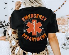 Emergency Department Shirt Halloween Nurse Shirt Halloween Er Nurse Shirt Nurse Halloween Shirt Emergency Nurse Shirt Er Shirt Er Halloween Shirt Halloween Er Shirt Er Nurse Halloween Shirt Er Tech Shirt Emergency Room Shirt Er Shirts Emergency Department Halloween Shirt Er Nurse Shirts Emergency Nurse Halloween Shirt Halloween Shirt Nurse Halloween Nurse Shirts QUICK  FACTS oGildan 5000 o100% preshrunk cotton. Unisex Heavy Cotton Tee oClassic fit. oTurn garment inside out. Wash and dry normally Emergency Nursing, Emergency Department, Er Nurse, Tech Shirt, Halloween Nurse, Emergency Room, Star Shirt, Nursing Shirts, Halloween Shirt