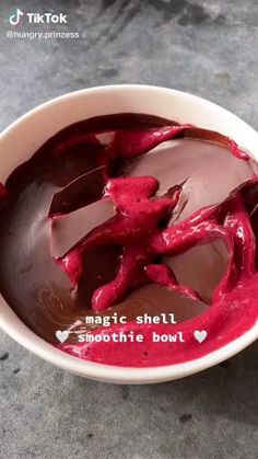 a bowl filled with chocolate and red liquid