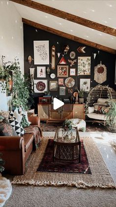 a living room filled with furniture and lots of pictures on the wall above it's fireplace