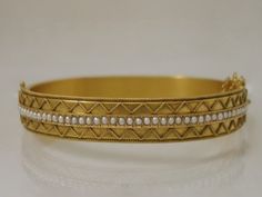 bangle bracelet has fifty one seed pearls in 15 ct gold by Castellani Solid Gold Bangle, Jewelry Set Design, Asian Jewelry, Egyptian Jewelry, Gold Bangles Design