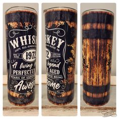 three shot glasses with whiskey labels on them