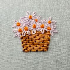 a close up of a piece of cloth with flowers on it