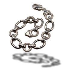 Gorgeous bracelet, 1980 Italian A  elegant 925 silver chain Elegant large chain: round links with  texture  polished and grooved,  oval links with shiny texture and smooth, alternating with small oval  shiny silver links A timeless jewel of great value and suitable to be worn by Bride Chic The bracelet is 19.5 cm in length (7.60inch)., High cm.1.2 (0.48inch). weighs 17.40gr. in very good condition Shipping from Italy to the rest of the world: please note that shipping costs are related to domest Timeless Sterling Silver Bracelet With Rectangular Links, Classic Silver Link Charm Bracelet, Classic Silver Charm Bracelet With Silver Chain, Classic Silver Chain Bracelet With Polished Finish, Sterling Silver Bracelet With Polished Rectangular Links, Sterling Silver Bracelet With Rectangular Links And Polished Finish, Classic White Gold Charm Bracelet With Silver Chain, Classic White Gold Metal Charm Bracelet, Timeless Sterling Silver Bracelet With Solid Link