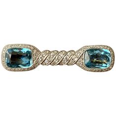 A stunning antique 1910 Aquamarine and Diamonds brooch mounted in Platinum over yellow Gold. Set with 2 beautiful Aquamarines weighing approximately 8 ct and approximately 1 ct of old European round cut Diamonds. An incredibly pretty piece of jewellery. Length: 4.9 cm Masterfully handcrafted piece! Authenticity and money back is guaranteed. For any enquires, please contact the seller through the message center. Message Center, Aquamarine Jewelry, Diamond Brooch, Aqua Marine, Gold Set, Gold Platinum, Gold Gold, Round Cut Diamond, Gold Yellow