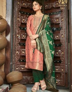 Women Salwar Suit with Jacquard Woven with Swarovski Diamond Work Peach color Processing Time : 5 Business Days Work : Jacquard Woven with Swarovski Diamond Work Fabric: Top : Banarasi Jacquard Bottom : Santoon Dupatta : Banarasi Jacquard Color: Top : Peach Bottom : Dark Green Dupatta : Dark Green #womanfashionsuit #onlinesuits #suitdesignforwomen #salwarsonlineindia #designerindiansuits #designersalwarsuits #designerwomenssuits #femalemodelsinsuits #indiansuitforladies #ladyinsuit Women Salwar Suit, Attractive Dresses, Unstitched Suits, Designer Salwar Suits, Suit Pant, Organza Dupatta, Silk Dupatta, Salwar Suit, Hip Dress