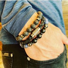 This set comes with three bracelets. One lava stone (stretch), one black braided leather bracelet with stainless steel magnetic closure, and one blue lapis with hematite accents (stretch). Braided Leather Bracelet, Blue Lapis, Black Braids, Lava Stone, Braided Leather, Men's Jewelry, Magnetic Closure, Black Blue, Leather Bracelet